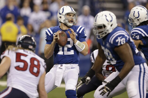 Indianapolis Colts quarterback Andrew Luck throws against the Houston Texans during the first half of an NFL football game in Indianapolis, Sunday, Dec. 15, 2013. (AP Photo/Darron Cummings)