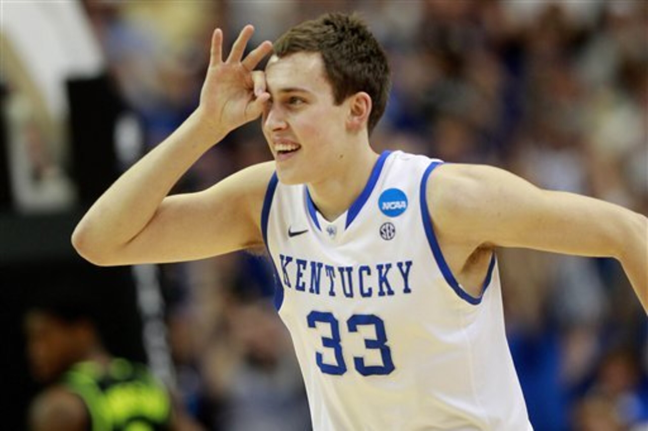 Kentucky's Kyle Wiltjer (33) reacts to a three-point shot against Baylor during the first half of an NCAA tournament South Regional finals college basketball game Sunday, March 25, 2012, in Atlanta. (AP Photo/John Bazemore)