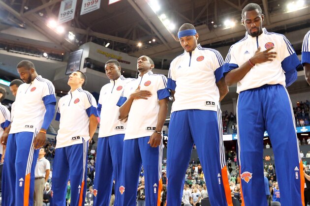 HARTFORD, CT - OCTOBER 8: Carmelo Anthony #7 of the New York Knicks stands for the national anthem before a game against the Boston Celtics during a preseason game at the XL Center on October 8, 2014 in Hartford, Connecticut. NOTE TO USER: User expressly acknowledges and agrees that, by downloading and or using this photograph, User is consenting to the terms and conditions of the Getty Images License Agreement. (Photo by Ned Dishman/NBAE via Getty Images) HARTFORD, CT - OCTOBER 8: Carmelo Anthony #7 of the New York Knicks stands for the national anthem before a game against the Boston Celtics during a preseason game at the XL Center on October 8, 2014 in Hartford, Connecticut. NOTE TO USER: User expressly acknowledges and agrees that, by downloading and or using this photograph, User is consenting to the terms and conditions of the Getty Images License Agreement. (Photo by Ned Dishman/NBAE via Getty Images)