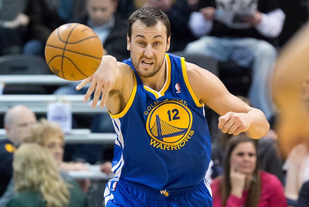 Jan 31, 2014; Salt Lake City, UT, USA; Golden State Warriors center Andrew Bogut (12) passes the ball during the first half against the Utah Jazz at EnergySolutions Arena. Mandatory Credit: Russ Isabella-USA TODAY Sports