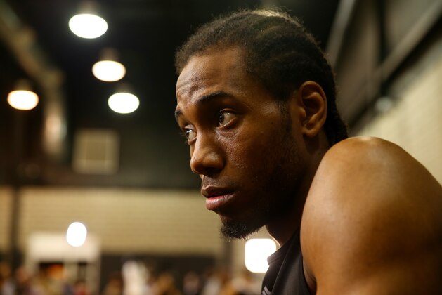 SAN ANTONIO, TX - JUNE 14:  Kawhi Leonard #2 of the San Antonio Spurs speaks to the media on an off day following Game Four of the 2014 NBA Finals against the Miami Heat at the Spurs Practice Facility on June 14, 2014 in San Antonio, Texas. NOTE TO USER: User expressly acknowledges and agrees that, by downloading and or using this photograph, User is consenting to the terms and conditions of the Getty Images License Agreement.  (Photo by Alex Trautwig/Getty Images)