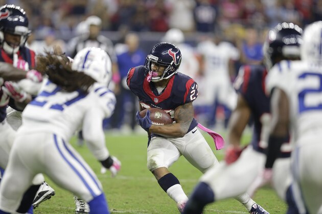 Houston Texans running back Arian Foster (23) makes a run during the second quarter of an NFL football game, Thursday, Oct. 9, 2014, in Houston. (AP Photo/Patric Schneider)