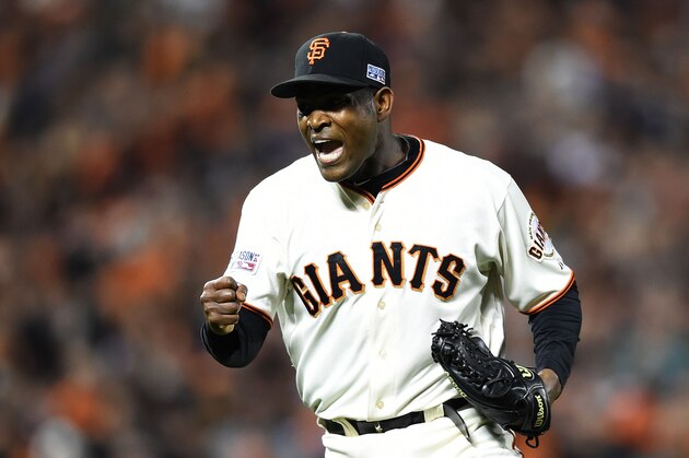 SAN FRANCISCO, CA - OCTOBER 07:  Santiago Casilla #46 of the San Francisco Giants celebrates after the final out of their 3 to 2 win over the Washington Nationals during Game Four of the National League Division Series at AT&T Park on October 7, 2014 in San Francisco, California.  (Photo by Thearon W. Henderson/Getty Images)