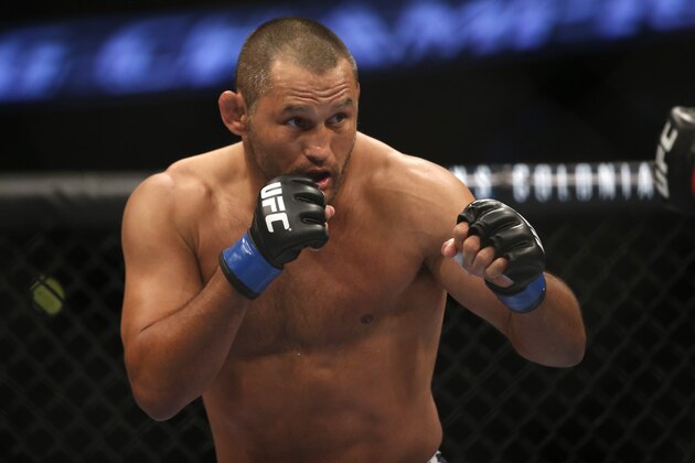 Lyoto Machida Dan Henderson during their UFC 157 light heavyweight mixed martial arts match in Anaheim, Calif., Saturday, Feb. 23, 2013. Machida won by split decision after the third round. (AP Photo/Jae C. Hong)