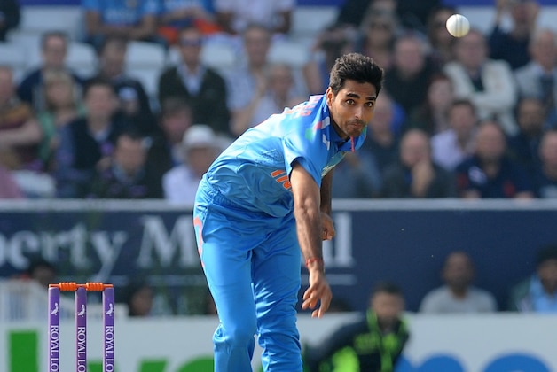 India's Bhuvneshwar Kumar bowling  during the fifth One Day International match between England and India at Headingley cricket ground, Leeds, England, Friday, Sept 5, 2014. (AP Photo/Rui Vieira)