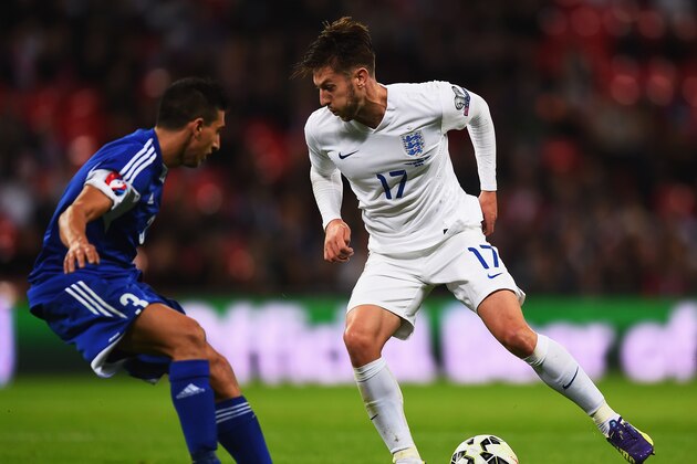 LONDON, ENGLAND - OCTOBER 09: Adam Lallana of England takes on Manuel Battistini of San Marino during the EURO 2016 Group E Qualifying match between England and San Marino at Wembley Stadium on October 9, 2014 in London, England. (Photo by Laurence Griffiths/Getty Images) LONDON, ENGLAND - OCTOBER 09: Adam Lallana of England takes on Manuel Battistini of San Marino during the EURO 2016 Group E Qualifying match between England and San Marino at Wembley Stadium on October 9, 2014 in London, England. (Photo by Laurence Griffiths/Getty Images)