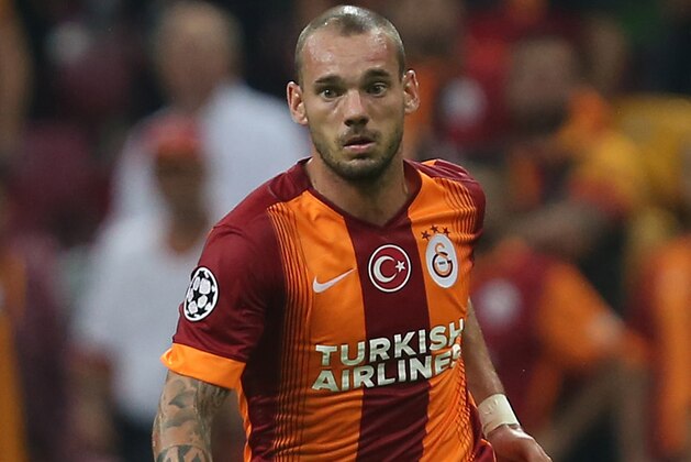 ISTANBUL, TURKEY -  SEPTEMBER 16: Wesley Sneijder of Galatasaray runs with the ball during the UEFA Champions League group D match between Galatasaray AS and RSC Anderlecht  against Anderlecht on September 16, 2014, at TT Arena Stadium in Istanbul, Turkey. (Photo by Burak Kara/Getty Images)