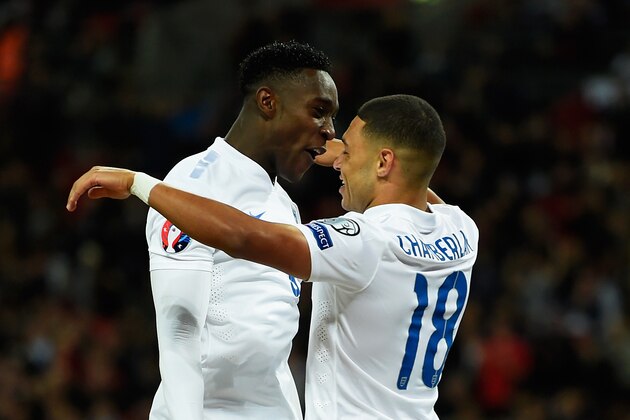 LONDON, ENGLAND - OCTOBER 09:  Danny Welbeck of England celebrates with Alex Oxlade-Chamberlain as he scores their third goal during the EURO 2016 Group E Qualifying match between England and San Marino at Wembley Stadium on October 9, 2014 in London, England.  (Photo by Mike Hewitt/Getty Images)