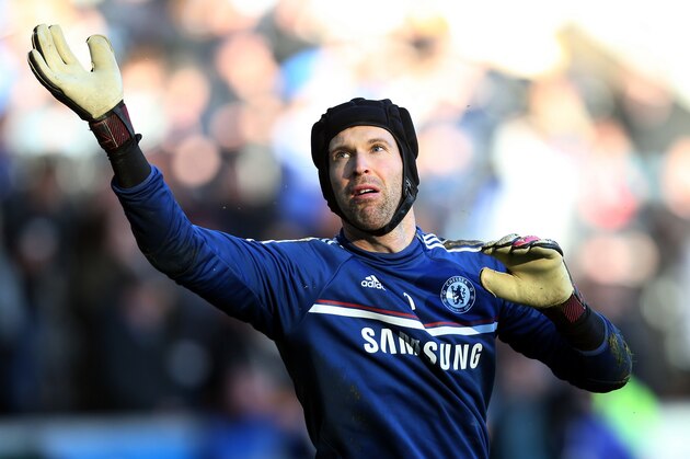 Chelsea's goalkeeper Petr Cech looks on ahead of their English Premier League soccer match against Hull City at the KC Stadium, Hull, England, Saturday, Jan. 11, 2014. (AP Photo/Scott Heppell)