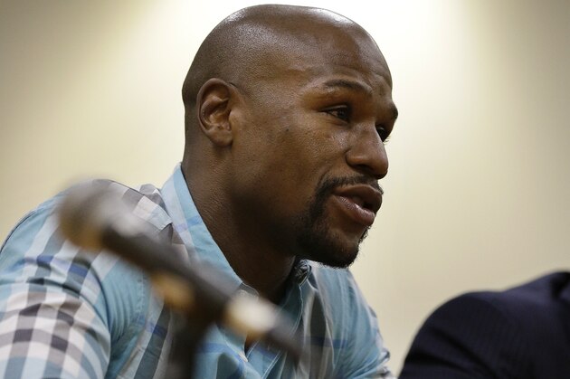 Boxer Floyd Mayweather Jr. appears before the Nevada Athletic Commission Tuesday, Sept. 23, 2014, in Las Vegas. Mayweather appeared before the commission to answer questions about scenes aired on the reality show