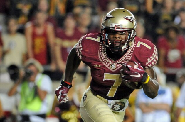 Sep 20, 2014; Tallahassee, FL, USA; Florida State Seminoles running back Mario Pender (7) runs the ball for a touchdown during the game against the Clemson Tigers at Doak Campbell Stadium. Mandatory Credit: Melina Vastola-USA TODAY Sports