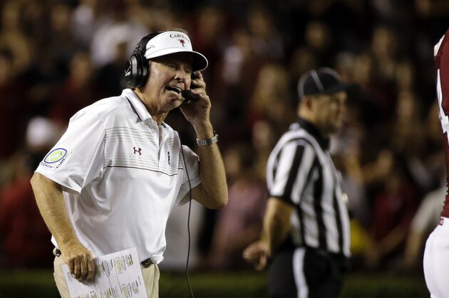 South Carolina head coach Steve Spurrier coaches his team from the sideline during the second half of an NCAA college football game against Missouri on, Saturday, Sept. 27, 2014, in Columbia, S.C. Missouri beat South Carolina 21-20.  (AP Photo/Stephen B. Morton)