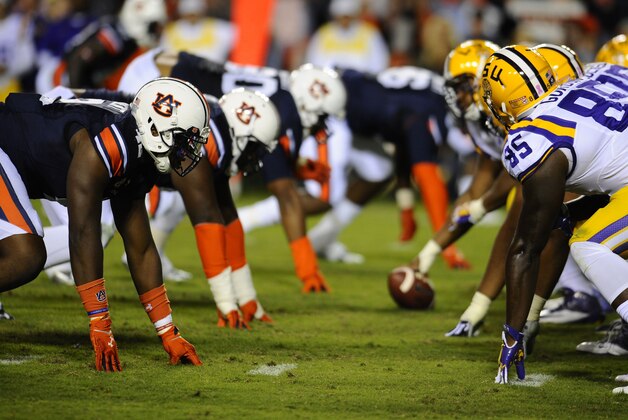 Oct 4, 2014; Auburn, AL, USA; Auburn Tigers and LSU Tigers at the line of scrimmage during the second half at Jordan Hare Stadium. Auburn won 41-7. Mandatory Credit: Shanna Lockwood-USA TODAY Sports