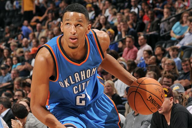 DENVER, CO - October 8: Andre Roberson #21 of the Oklahoma City Thunder drives against the Denver Nuggets on October 8, 2014 at the Pepsi Center in Denver, Colorado. NOTE TO USER: User expressly acknowledges and agrees that, by downloading and/or using this Photograph, user is consenting to the terms and conditions of the Getty Images License Agreement. Mandatory Copyright Notice: Copyright 2014 NBAE (Photo by Bart Young/NBAE via Getty Images)