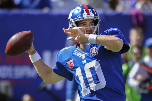 New York Giants quarterback Eli Manning throws against the Atlanta Falcons during the first half of an NFL football game, Sunday, Oct. 5, 2014, in East Rutherford, N.J. (AP Photo/Bill Kostroun)