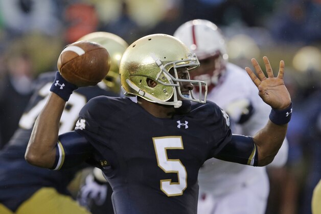 Notre Dame quarterback Everett Golson (5) throws during the second half of an NCAA college football game against Stanford, Saturday, Oct. 4, 2014, in South Bend, Ind. Notre Dame defeated Stanford 17-14. (AP Photo/Darron Cummings)