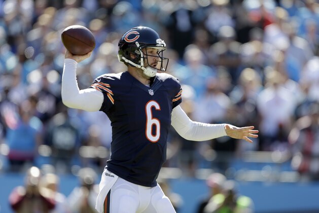 Chicago Bears' Jay Cutler (6) aims a pass against the Carolina Panthers during the second half of an NFL football game in Charlotte, N.C., Sunday, Oct. 5, 2014. The Panthers won 31-24. (AP Photo/Bob Leverone)