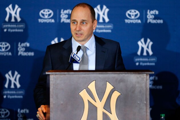 NEW YORK, NY - FEBRUARY 11:  General Manager Brian Cashman of the New York Yankees speaks during a news conference introducing Masahiro Tanaka (not pictured) to the media on February 11, 2014 at Yankee Stadium in the Bronx borough of New York City.  (Photo by Jim McIsaac/Getty Images)