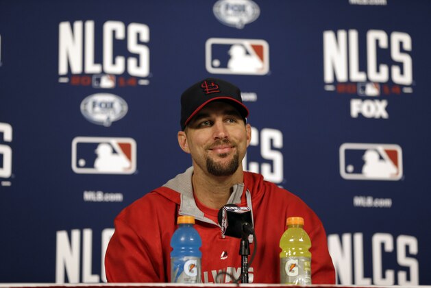 St. Louis Cardinals starting pitcher Adam Wainwright smiles during a news conference Friday, Oct. 10, 2014, in St. Louis. Wainwright will start for the Cardinals when they play the San Francisco Giants in Game 1 of baseball's National League Championship Series on Saturday in St. Louis. (AP Photo/Jeff Roberson)