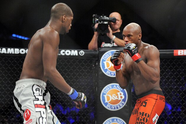 May 17, 2014; Southaven, MS, USA; Ricky Rainey (red gloves) fights against  Michael Page (blue gloves) during BFC 120 at Landers Center. Mandatory Credit: Justin Ford-USA TODAY Sports