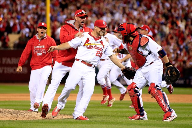 ST LOUIS, MO - OCTOBER 07:  Trevor Rosenthal #26 of the St. Louis Cardinals celebrates with teammates after defeating the Los Angeles Dodgers in Game Four of the National League Divison Series at Busch Stadium on October 7, 2014 in St Louis, Missouri.  (Photo by Jamie Squire/Getty Images)