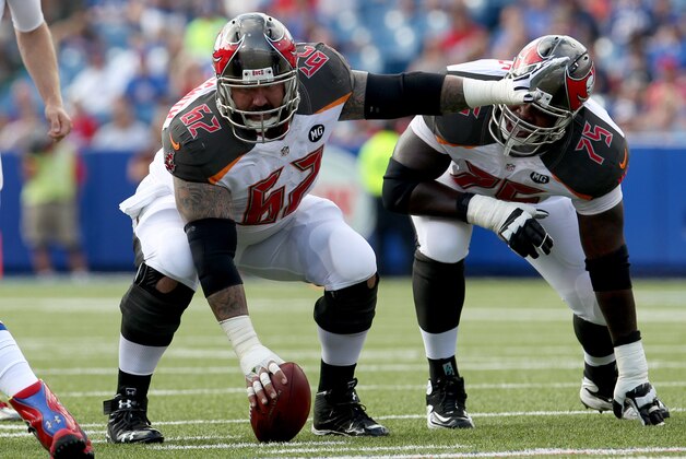Aug 23, 2014; Orchard Park, NY, USA; Tampa Bay Buccaneers center Evan Dietrich-Smith (62) prepares to snap the ball during a game against the Buffalo Bills at Ralph Wilson Stadium. Mandatory Credit: Timothy T. Ludwig-USA TODAY Sports