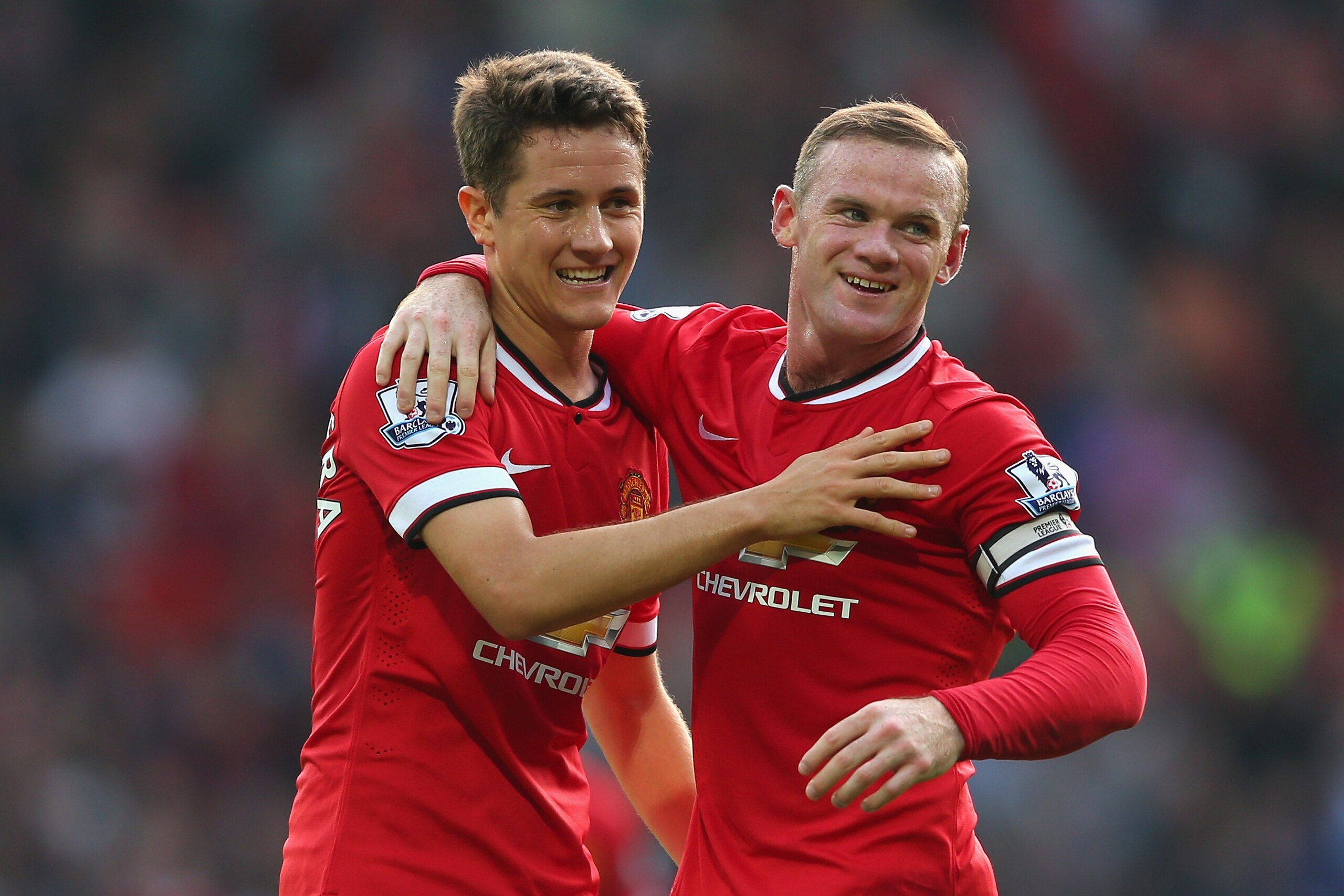 MANCHESTER, ENGLAND - SEPTEMBER 14: Wayne Rooney of Manchester United celebrates scoring the third goal with team-mate Ander Herrera (L), during the Barclays Premier League match between Manchester United and Queens Park Rangers at Old Trafford on September 14, 2014 in Manchester, England. (Photo by Alex Livesey/Getty Images) MANCHESTER, ENGLAND - SEPTEMBER 14: Wayne Rooney of Manchester United celebrates scoring the third goal with team-mate Ander Herrera (L), during the Barclays Premier League match between Manchester United and Queens Park Rangers at Old Trafford on September 14, 2014 in Manchester, England. (Photo by Alex Livesey/Getty Images)