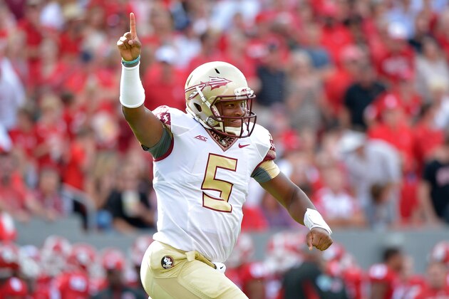 RALEIGH, NC - SEPTEMBER 27: Jameis Winston #5 of the Florida State Seminoles celebrates after throwing a first quarter touchdown pass during their game against the North Carolina State Wolfpack at Carter-Finley Stadium on September 27, 2014 in Raleigh, North Carolina. (Photo by Grant Halverson/Getty Images)