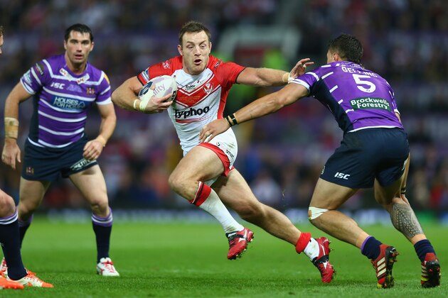 MANCHESTER, ENGLAND - OCTOBER 11:  James Roby (C) of St Helens holds off Anthony Gelling (R) of Wigan during the First Utility Super League Grand Final match between St Helens and Wigan Warriors at Old Trafford on October 11, 2014 in Manchester, England.  (Photo by Michael Steele/Getty Images)
