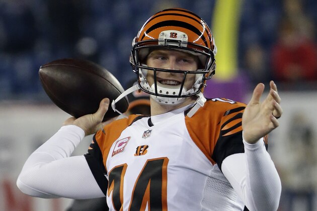 Cincinnati Bengals quarterback Andy Dalton warms up before an NFL football game against the New England Patriots, Sunday, Oct. 5, 2014, in Foxborough, Mass. (AP Photo/Stephan Savoia)