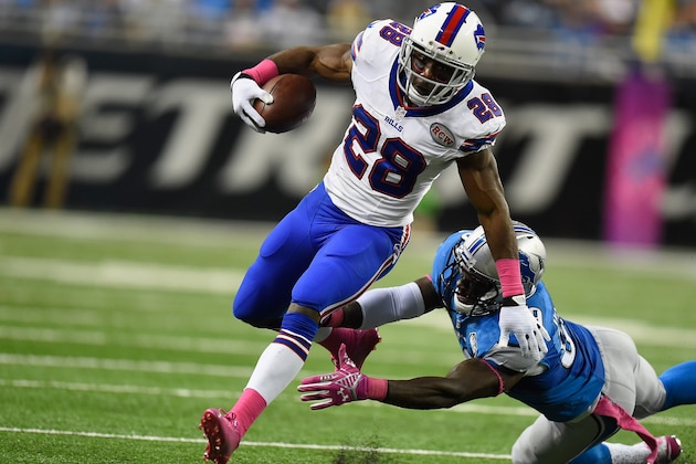 DETROIT, MI - OCTOBER 05: C.J. Spiller #28 of the Buffalo Bills tries to avoid the tackle by Tahir Whitehead #59 of the Detroit Lions in the third quarter at Ford Field on October 05, 2014 in Detroit, Michigan. (Photo by Joe Sargent/Getty Images)