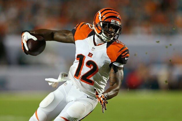 MIAMI GARDENS, FL - OCTOBER 31: Mohamed Sanu #12 of the Cincinnati Bengals runs after a catch during a game against the Miami Dolphins at Sun Life Stadium on October 31, 2013 in Miami Gardens, Florida. (Photo by Mike Ehrmann/Getty Images)