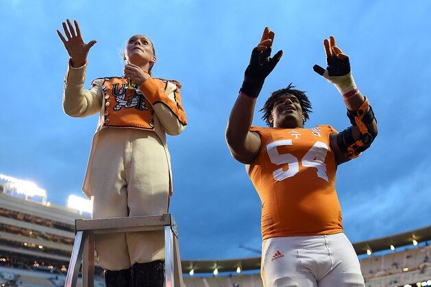 KNOXVILLE, TN - OCTOBER 11:  Jordan Williams #54 of the Tennessee Volunteers leads the band following a game against the Chattanooga Mocs at Neyland Stadium on October 11, 2014 in Knoxville, Tennessee.  Tennessee won the game 45-10.  (Photo by Stacy Revere/Getty Images)