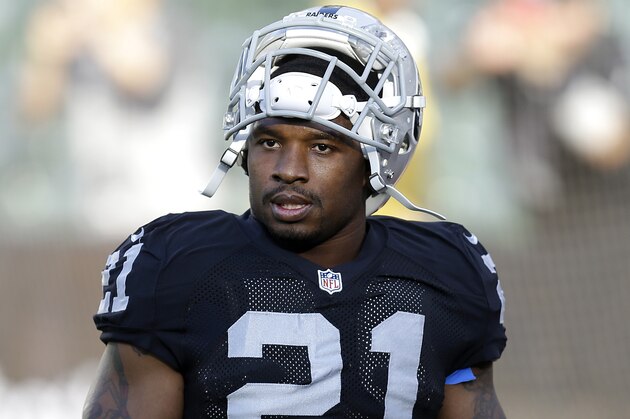 Oakland Raiders running back Maurice Jones-Drew (21) warms up before an NFL preseason football game against the Seattle Seahawks in Oakland, Calif., Thursday, Aug. 28, 2014. (AP Photo/Ben Margot)