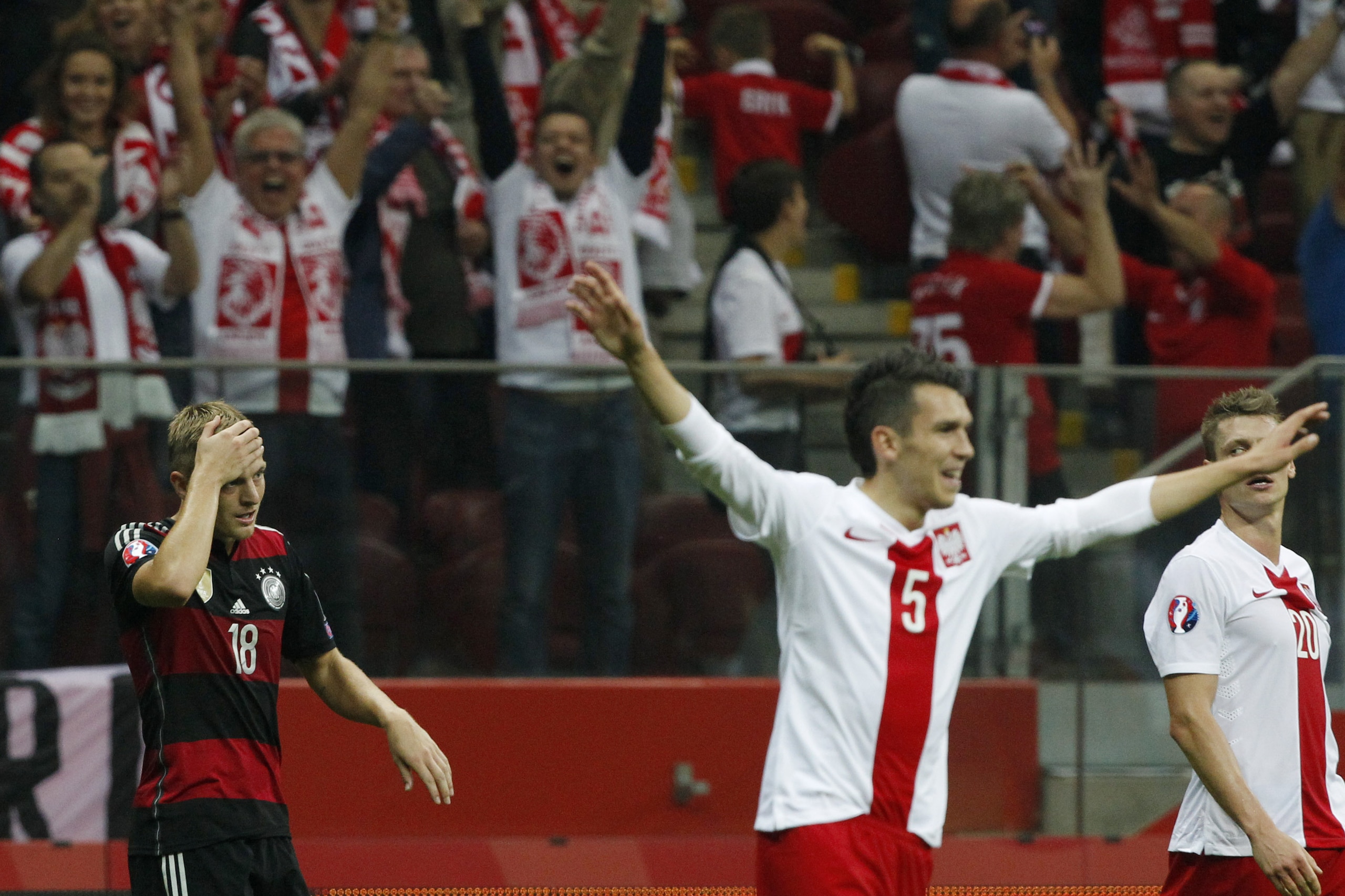 Germany's Toni Kroos touches is forehead after Poland won 2-0 during a Euro 2016 group D qualifying soccer match between Poland and Germany in Warsaw, Poland,Saturday, Oct. 11, 2014. (AP Photo/Czarek Sokolowski) Germany's Toni Kroos touches is forehead after Poland won 2-0 during a Euro 2016 group D qualifying soccer match between Poland and Germany in Warsaw, Poland,Saturday, Oct. 11, 2014. (AP Photo/Czarek Sokolowski)