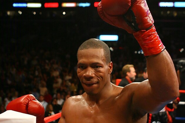 LOS ANGELES, CA - SEPTEMBER 26:  Cornelius Bundrage raises his arms after Bundrage defeated Norberto Bravo ater their bronze bout at the 'The Contender' Season Two Finale at Staples Center on September 26, 2006 in Los Angeles, California. Bundrage won after the fight was stopped in the 7th round.  (Photo by Al Bello/Getty Images)