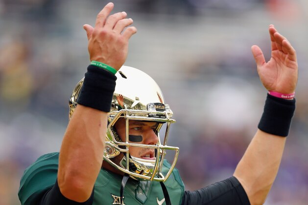 WACO, TX - OCTOBER 11: Bryce Petty #14 of the Baylor Bears prepares to take on the TCU Horned Frogs at McLane Stadium on October 11, 2014 in Waco, Texas. (Photo by Tom Pennington/Getty Images) WACO, TX - OCTOBER 11: Bryce Petty #14 of the Baylor Bears prepares to take on the TCU Horned Frogs at McLane Stadium on October 11, 2014 in Waco, Texas. (Photo by Tom Pennington/Getty Images)