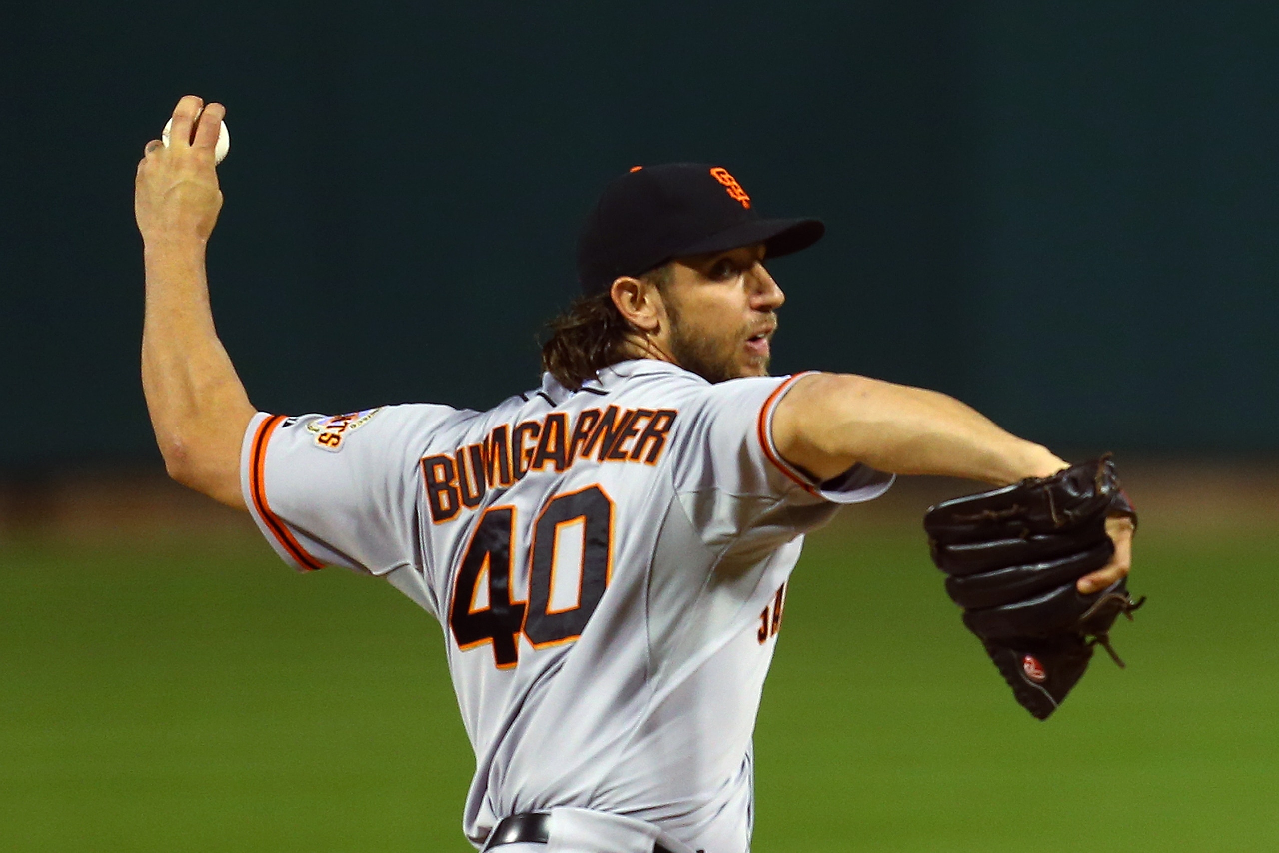 San Francisco Giants starting pitcher Madison Bumgarner throws during the first inning of Game 1 of the National League baseball championship series against the St. Louis Cardinals Saturday, Oct. 11, 2014, in St. Louis. (AP Photo/Dilip Vishwanat, Pool)