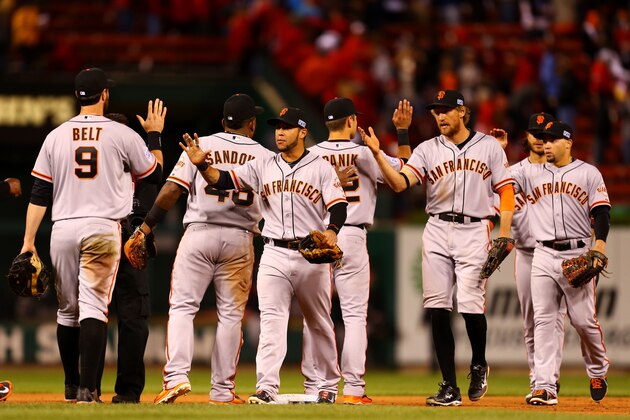 ST LOUIS, MO - OCTOBER 11:  The San Francisco Giants celebrate their 3 to 0 win over the St. Louis Cardinals in Game One of the National League Championship Series at Busch Stadium on October 11, 2014 in St Louis, Missouri.  (Photo by Dilip Vishwanat/Getty Images)