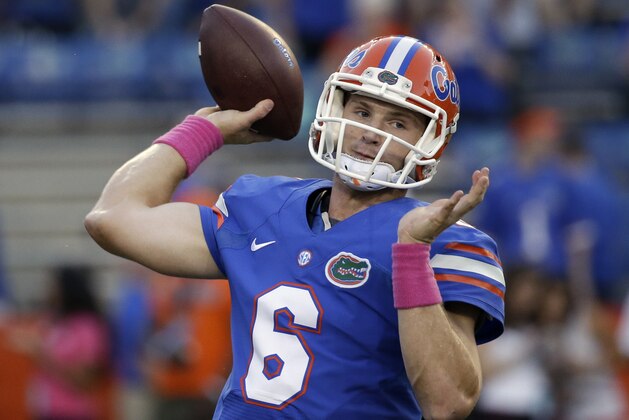Florida quarterback Jeff Driskel (6) warms up prior to an NCAA college football game against LSU in Gainesville, Fla., Saturday, Oct. 11, 2014. (AP Photo/John Raoux)