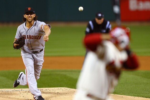 San Francisco Giants starting pitcher Madison Bumgarner throws during the first inning of Game 1 of the National League baseball championship series against the St. Louis Cardinals Saturday, Oct. 11, 2014, in St. Louis. (AP Photo/Dilip Vishwanat, Pool)