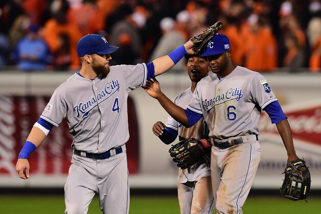 BALTIMORE, MD - OCTOBER 11:  Alex Gordon #4, Jarrod Dyson #1 and Lorenzo Cain #6 of the Kansas City Royals celebrate defeat the Baltimore Orioles 6 to 4 in Game Two of the American League Championship Series at Oriole Park at Camden Yards on October 11, 2014 in Baltimore, Maryland.  (Photo by Patrick Smith/Getty Images)