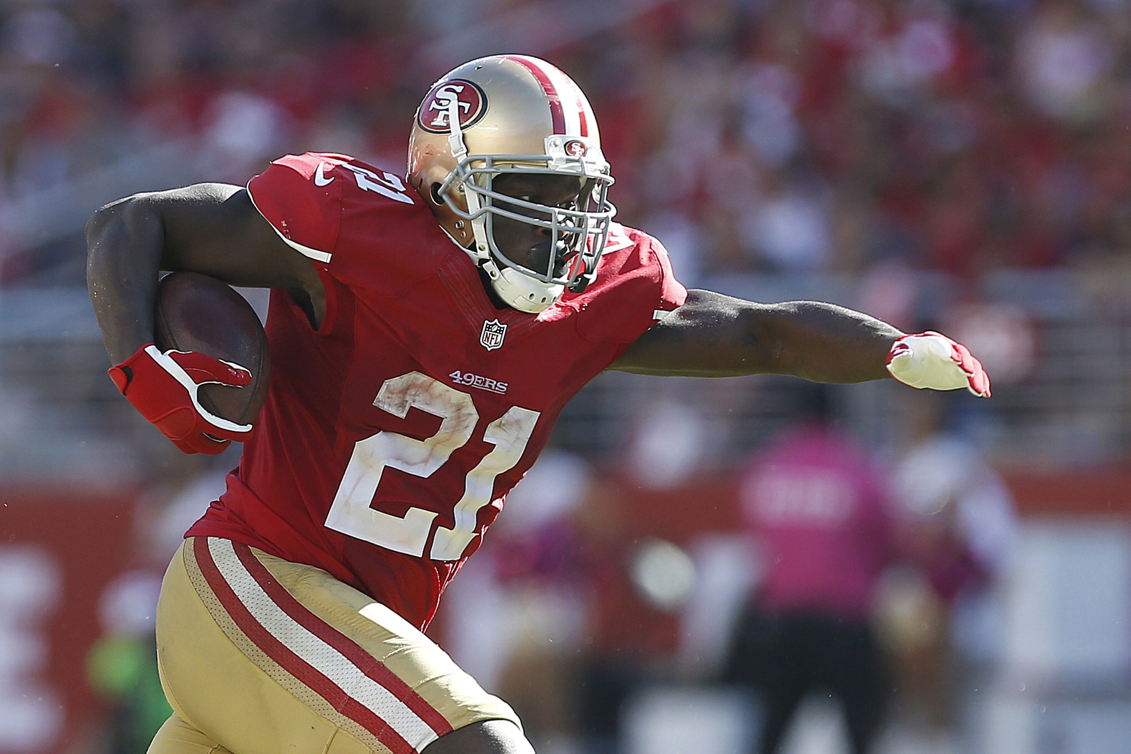 San Francisco 49ers running back Frank Gore (21) runs against the Kansas City Chiefs during the fourth quarter of an NFL football game in Santa Clara, Calif., Sunday, Oct. 5, 2014. (AP Photo/Tony Avelar) San Francisco 49ers running back Frank Gore (21) runs against the Kansas City Chiefs during the fourth quarter of an NFL football game in Santa Clara, Calif., Sunday, Oct. 5, 2014. (AP Photo/Tony Avelar)