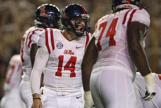 Oct 11, 2014; College Station, TX, USA; Mississippi Rebels quarterback Bo Wallace (14) calls a play during the second quarter against the Texas A&M Aggies at Kyle Field. Mandatory Credit: Troy Taormina-USA TODAY Sports