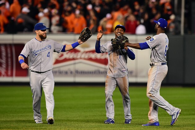 BALTIMORE, MD - OCTOBER 11:  Alex Gordon #4, Jarrod Dyson #1 and Lorenzo Cain #6 of the Kansas City Royals celebrate defeat the Baltimore Orioles 6 to 4 in Game Two of the American League Championship Series at Oriole Park at Camden Yards on October 11, 2014 in Baltimore, Maryland.  (Photo by Patrick Smith/Getty Images)