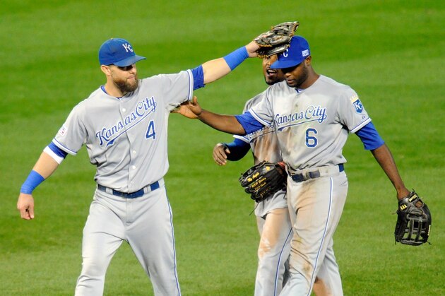 BALTIMORE, MD - OCTOBER 11:  Alex Gordon #4, Jarrod Dyson #1 and Lorenzo Cain #6 of the Kansas City Royals celebrate defeat the Baltimore Orioles 6 to 4 in Game Two of the American League Championship Series at Oriole Park at Camden Yards on October 11, 2014 in Baltimore, Maryland.  (Photo by Mitchell Layton/Getty Images)