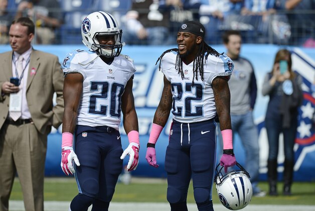 Tennessee Titans players Bishop Sankey (20) and Dexter McCluster (22) talk as they warm up before an NFL football game between the Titans and the Cleveland Browns Sunday, Oct. 5, 2014, in Nashville, Tenn. (AP Photo/Mark Zaleski)