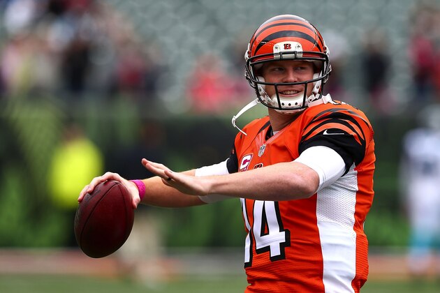 CINCINNATI, OH - OCTOBER 12:  Andy Dalton #14 of the Cincinnati Bengals warms up prior to the start of the game against the Carolina Panthers at Paul Brown Stadium on October 12, 2014 in Cincinnati, Ohio. (Photo by Andy Lyons/Getty Images)