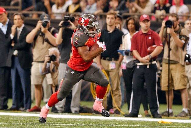 Oct 5, 2014; New Orleans, LA, USA; Tampa Bay Buccaneers running back Doug Martin (22) against the New Orleans Saints during the first quarter of a game at Mercedes-Benz Superdome. Mandatory Credit: Derick E. Hingle-USA TODAY Sports