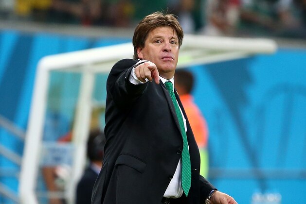 RECIFE, BRAZIL - JUNE 23:  Head coach Miguel Herrera of Mexico gestures during the 2014 FIFA World Cup Brazil Group A match between Croatia and Mexico at Arena Pernambuco on June 23, 2014 in Recife, Brazil.  (Photo by Robert Cianflone/Getty Images)